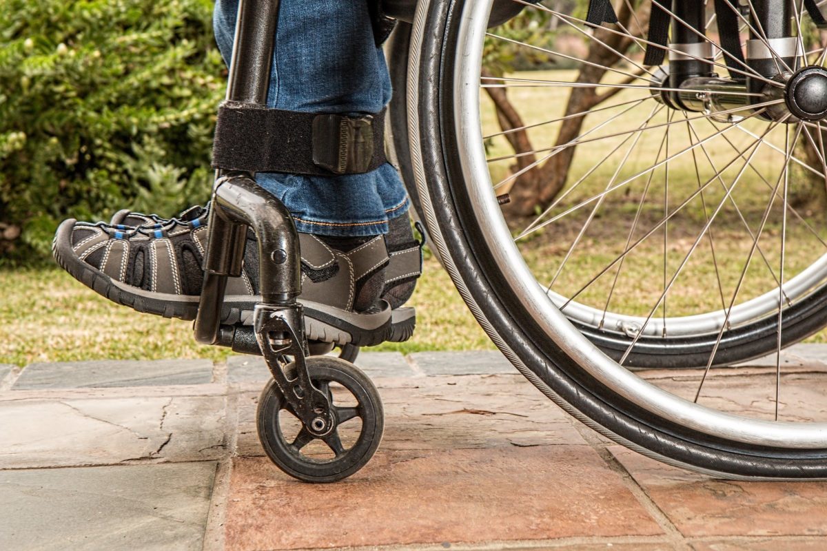 Person im Rollstuhl, private Unfallversicherung WVK